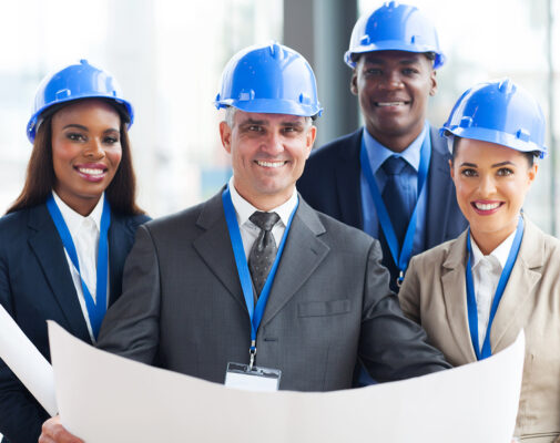 team of successful construction managers in office